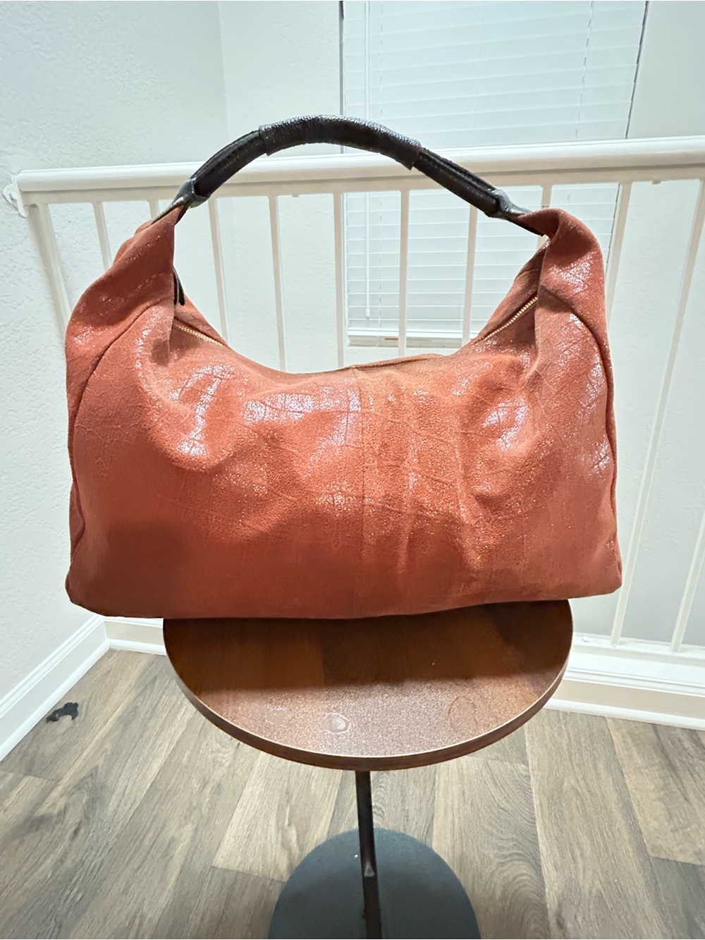 Stylish Rust Leather Hobo Bag with Dark Top Handle